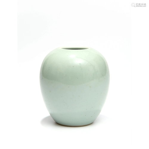 A Pea Green Glaze Carved Porcelain Zun