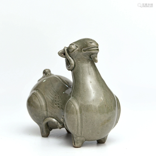 A Celadon Glazed Porcelain Sheep Zun