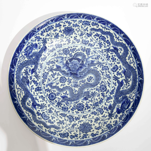 A Large and Rare Blue and White ‘Wrapped Floral & Dragon’ Porcelain Dish