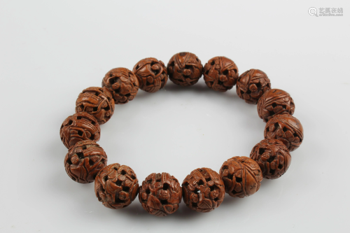 Chinese Seed Pit Bracelet, 15 beads