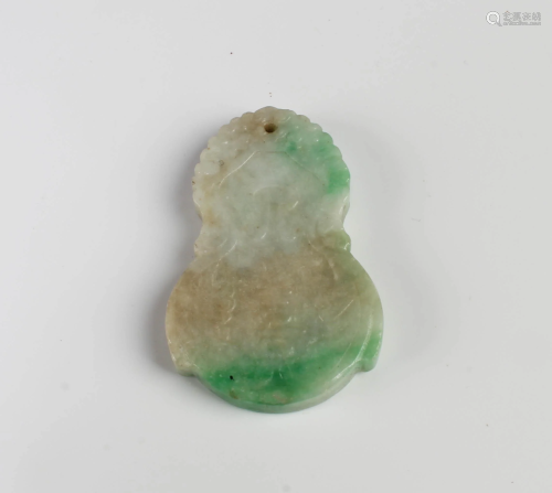 A Carved Jade Pendant