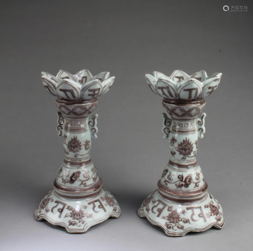A Pair of Chinese Iron Red Porcelain Candle Holders