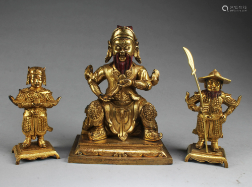 A Group of Three Bronze Deity Statues