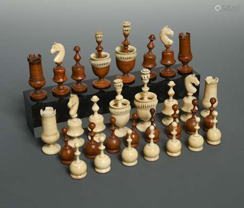 A turned bone and boxwood 'Lyon' variant chess set, 19th century,