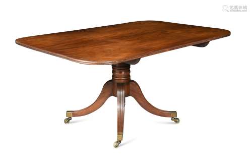 A Regency mahogany pedestal dining table,