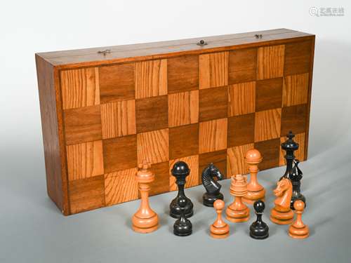 A large scale chess set in folding box, 20th century,