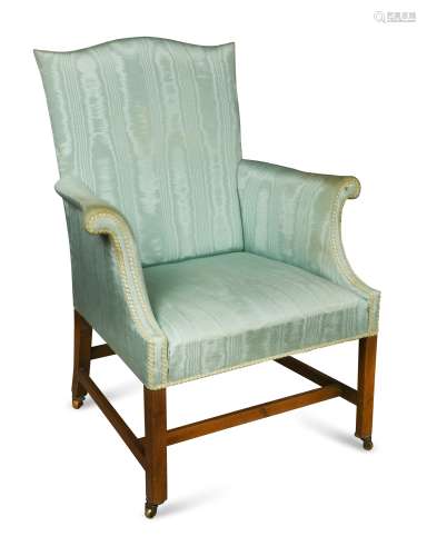 A George III mahogany library armchair,