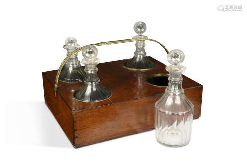 A mahogany decanter carrier with brass handles, in the George III style,