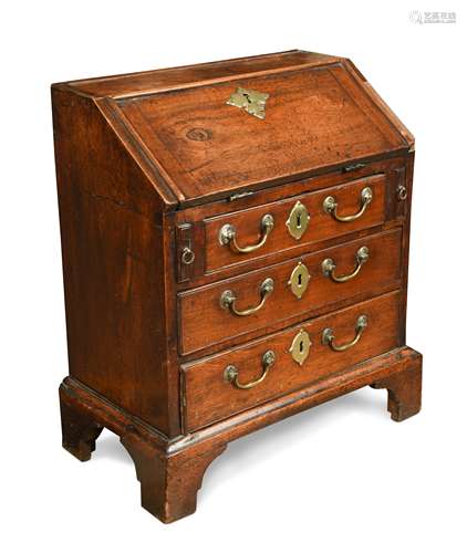 A small scale early George III fall fronted mahogany bureau,