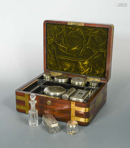 A George IV mahogany brass bound dressing case,