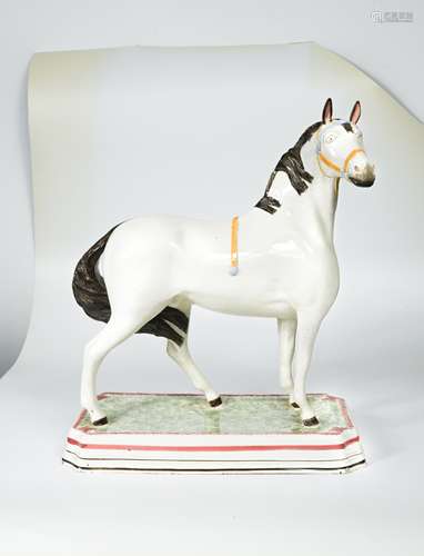 A fine and rare Leeds pottery horse, circa 1825,