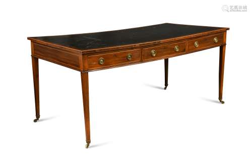 A large Regency double sided mahogany and boxwood library table,