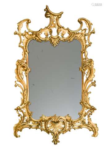 A carved rococo style giltwood mirror, 19th century,