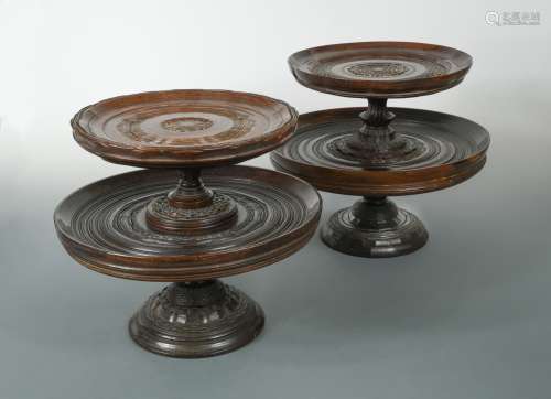 A matched pair of engine turned lignum vitae two-tier tazze, late 17th century,