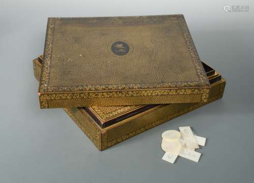 A Chinese export black and gold lacquer games box, 19th century,