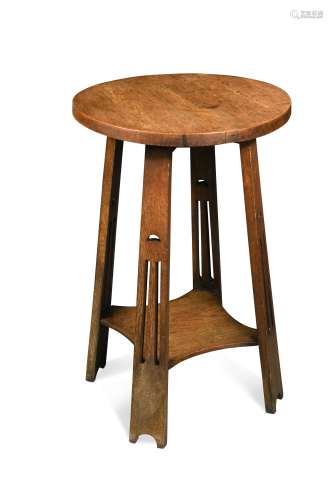 An Arts and Crafts oak side table,