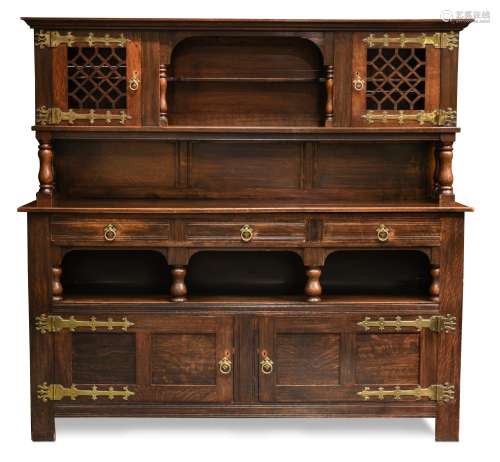 An early 20th century Arts & Crafts style oak side cabinet,