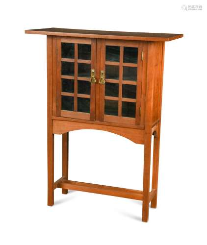 After George Walton, an Arts & Crafts glazed oak 'Holland' style cabinet,
