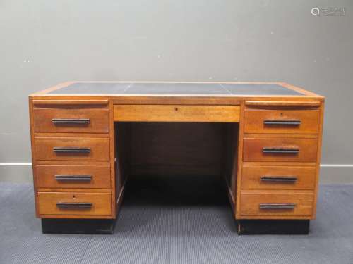 An Art Deco oak twin pedestal desk,