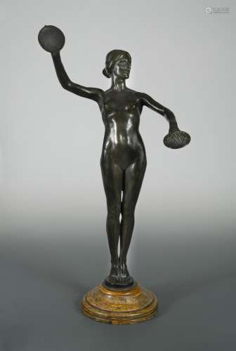 An early 20th century bronze model of a cymbal playing female nude,