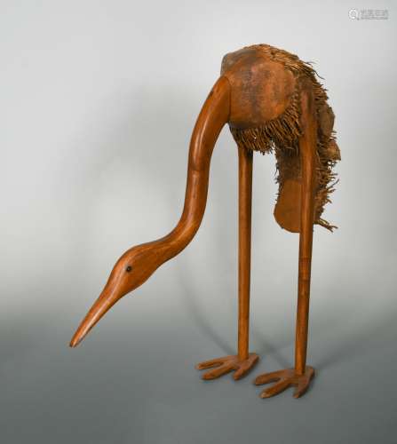 In the manner of Henry Howell (YZ), a large root carving of a stork,