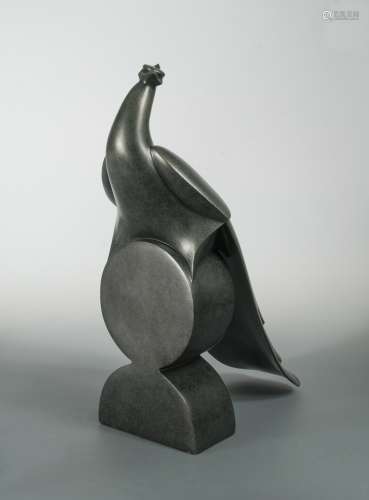 A modern patinated composition figure of a peacock,