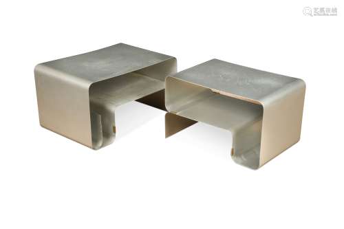 Two similar bent aluminium side tables,