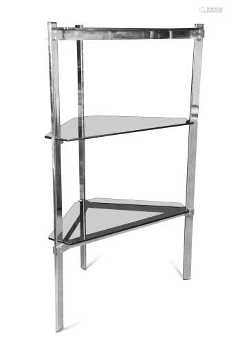 A set of free-standing chrome and smoke glass open shelves,