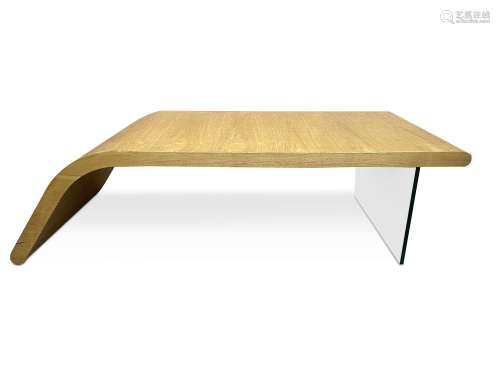 A contemporary bentwood and glass coffee table,