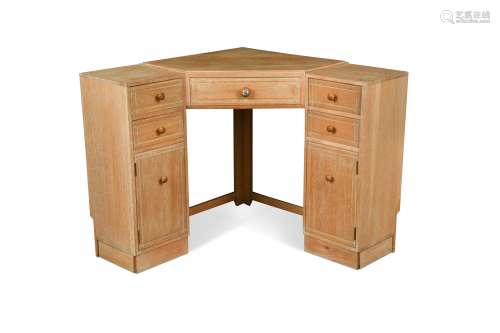 A Heal's limed oak corner desk,