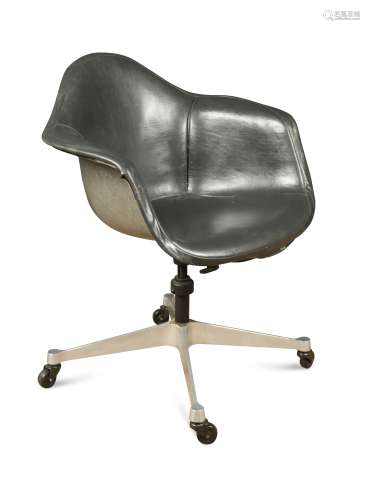 Charles & Ray Eames, a PACC fibreglass shell swivel armchair,