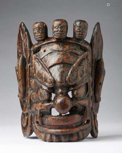 Himalayan Art. A wooden mask depicting a Dharmapal…