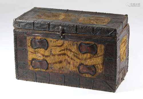 Himalayan Art. A Tibetan chest with tiger skin ins…