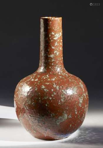 Chinese Art. A red mottled glazed globular porcela…