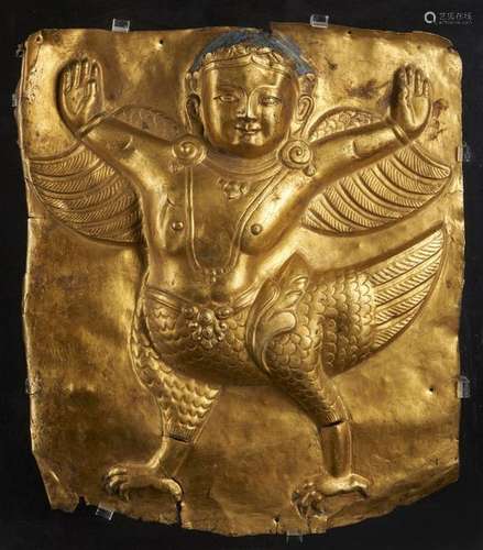 Himalayan Art. A large embossed gilt copper plaque…