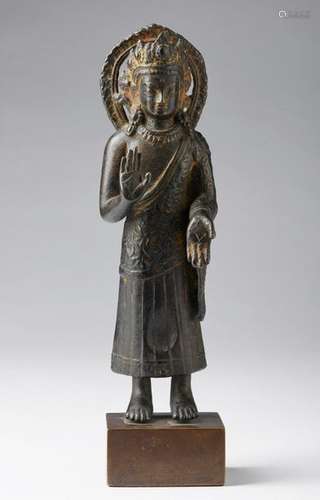 Himalayan Art. An iron cast figure of Buddha Dipan…