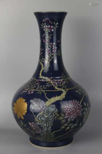 A BLUE GLAZE POWDER ENAMEL VASE PAINTED WITH FLOWERS