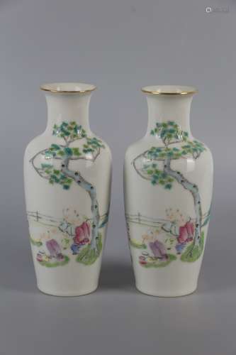 A PAIR OF ENAMEL VASES PAINTED