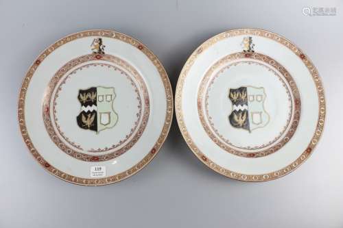A pair of porcelain plates with Qianlong's famille rose Badge
