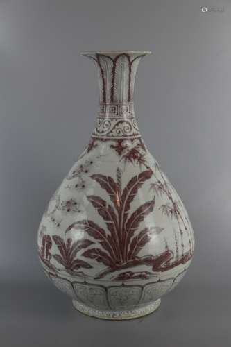 AN UNDERGLAZED RED OKHO SPRING BOTTLE WITH