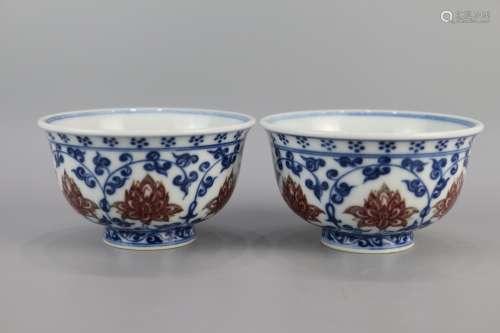 A pair of blue and white glazed black tea cups