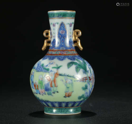 A OVERGLAZED BOTTLE PAINTED WITH CHARACTERS