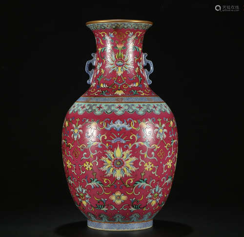 A PASTEL SKIMMING BOTTLE PAINTED WITH FLOWER PATTERNS