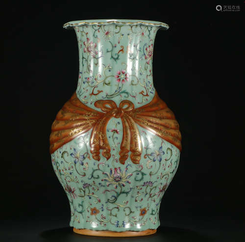 A CELADON GLAZED VASE