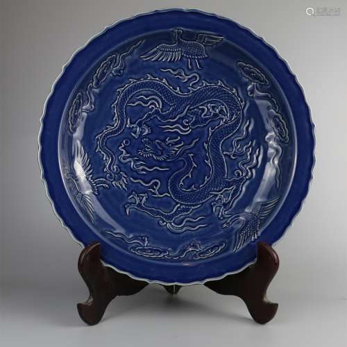 Dark engraved dragon pattern flower plate with seasonal blue glaze