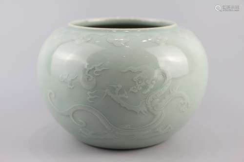 Water cup with dark dragon pattern on bean green glaze