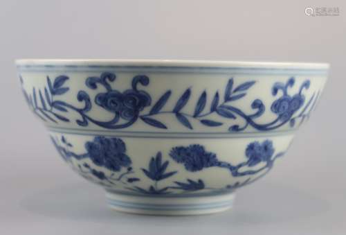 Bowl decorated with blue and white flowers