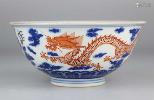 Bowl with blue and white alum and red dragon pattern