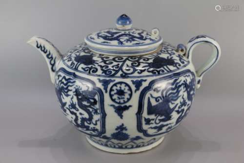 Blue and white teapot with dragon and phoenix patterns
