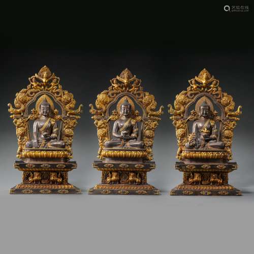 QING DYNASTY, A GROUP OF SILVER BUDDHA PARTLY GILT